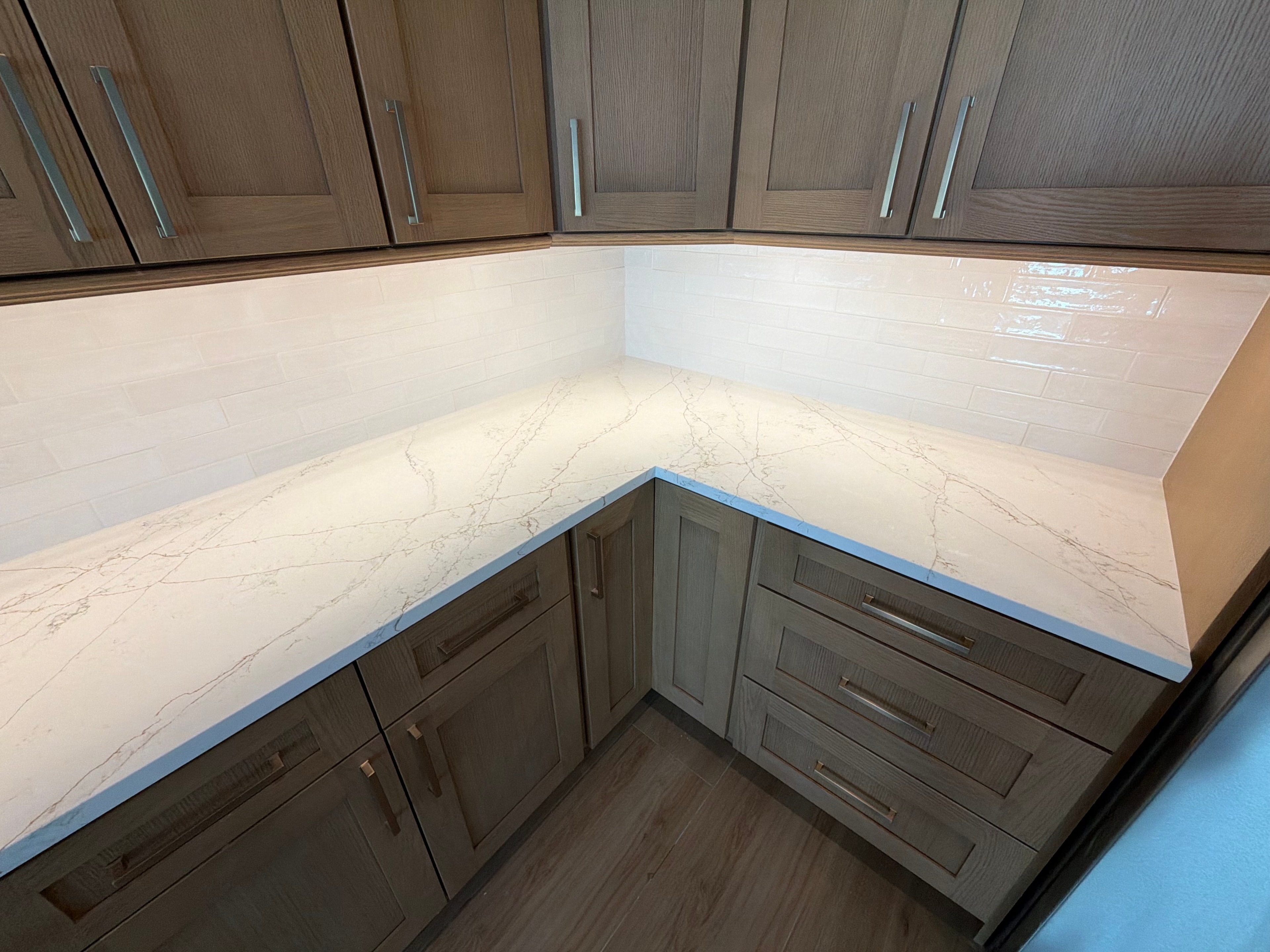 Kitchen countertop with white marble tile backsplash — Sebring, FL