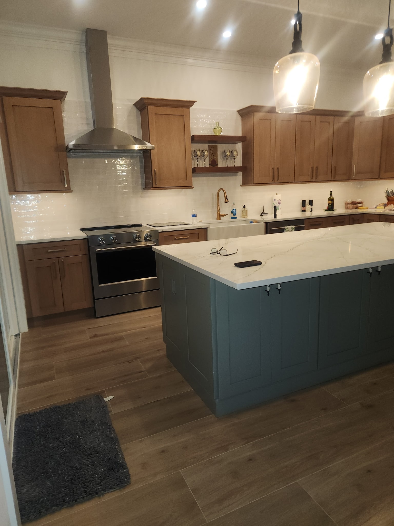 Modern kitchen with wood cabinets and island — Highlands County